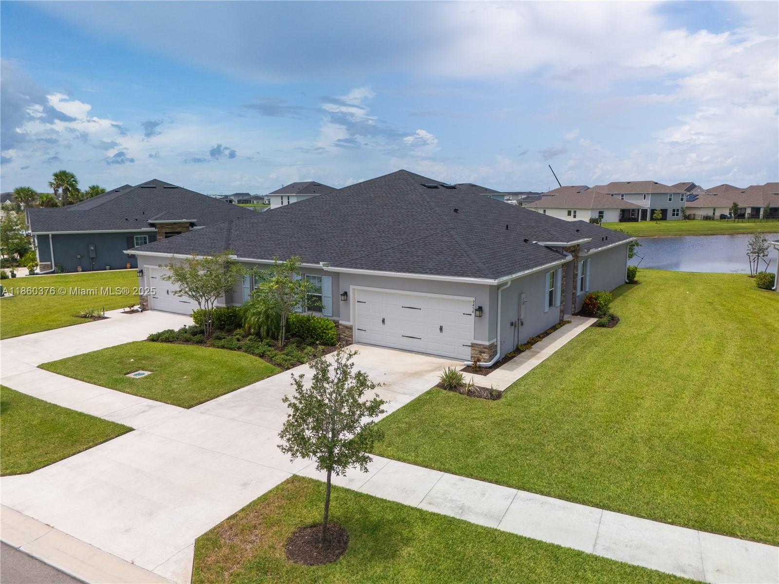 Experience elevated living in this stylish newer-construction 3-bed, 2-bath villa in Port St. Lucie’s amenity-rich Central Park community. This open-concept gem features a gourmet kitchen with stainless steel appliances, a large island, and seamless flow to the covered lanai overlooking tranquil water views. The spacious owner’s suite boasts dual sinks and a walk-in closet. Smart home upgrades include an Ecobee thermostat and WiFi garage opener. Enjoy low-maintenance living with low HOA and access to resort-style amenities: pool, splash park, pickleball, tennis, clubhouse & more. Just minutes from top-rated schools, EOS Fitness, grocery stores, and shopping—everything you need is within reach. All ages welcome!