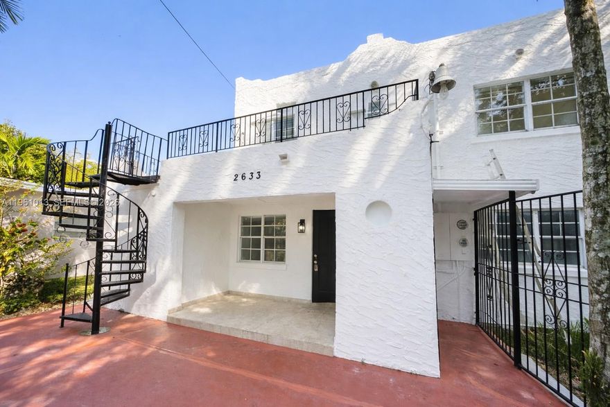 Unique two-story Old Spanish duplex with income and redevelopment potential. Downstairs 2BD/2BA plus large family room easily convertible to a 3rd bedroom. Ceramic tile throughout, stainless steel appliances, central A/C, and large patio. Parking for up to 6 cars. Upstairs 1BD/1BA apartment with full kitchen and bath, ceramic tile, and rooftop deck with Coral Gables views. Walk to Miracle Mile and Coral Way shopping, dining, banks, and entertainment. Coral Gables Hospital nearby. Ideal for owner-occupant, investor, or new construction development.