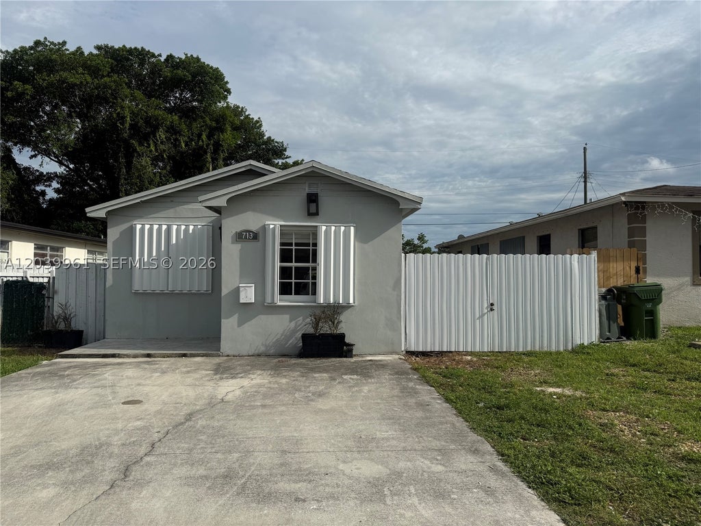 Photo of 713 NW 4th St, Hallandale Beach, FL 33009 (MLS # A12039961)