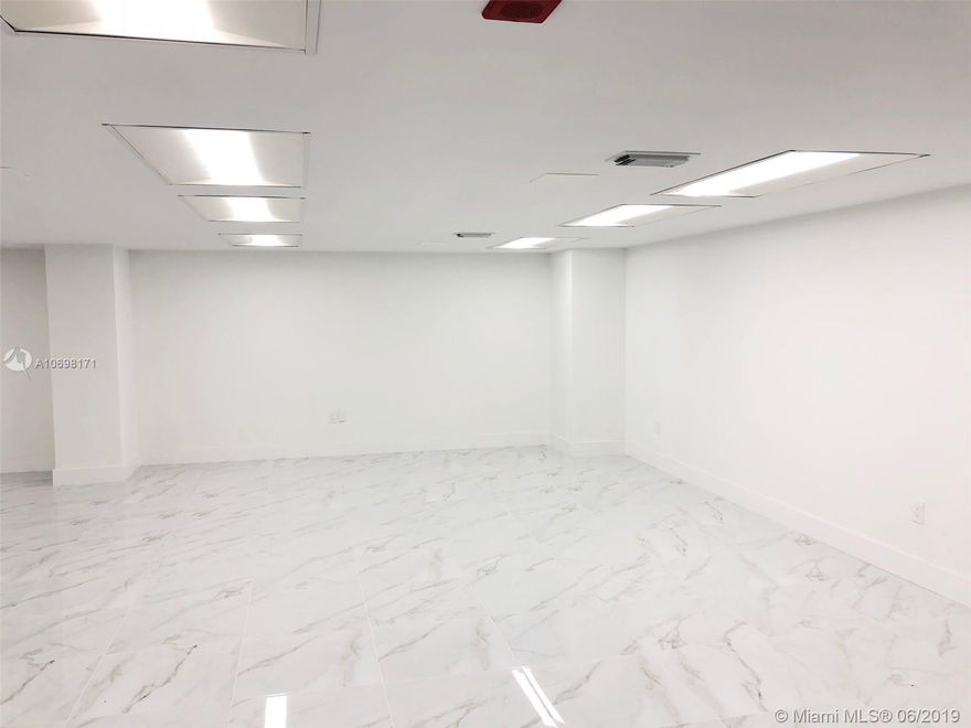 Perfect office space available in a great location!! Completely renovated office space that offers an open floor plan and beautiful white porcelain floors. Parking on the same floor as unit, and plenty of guest parking. Building offers amenities, which include: pool, gym, gated parking, and 24/7 security.