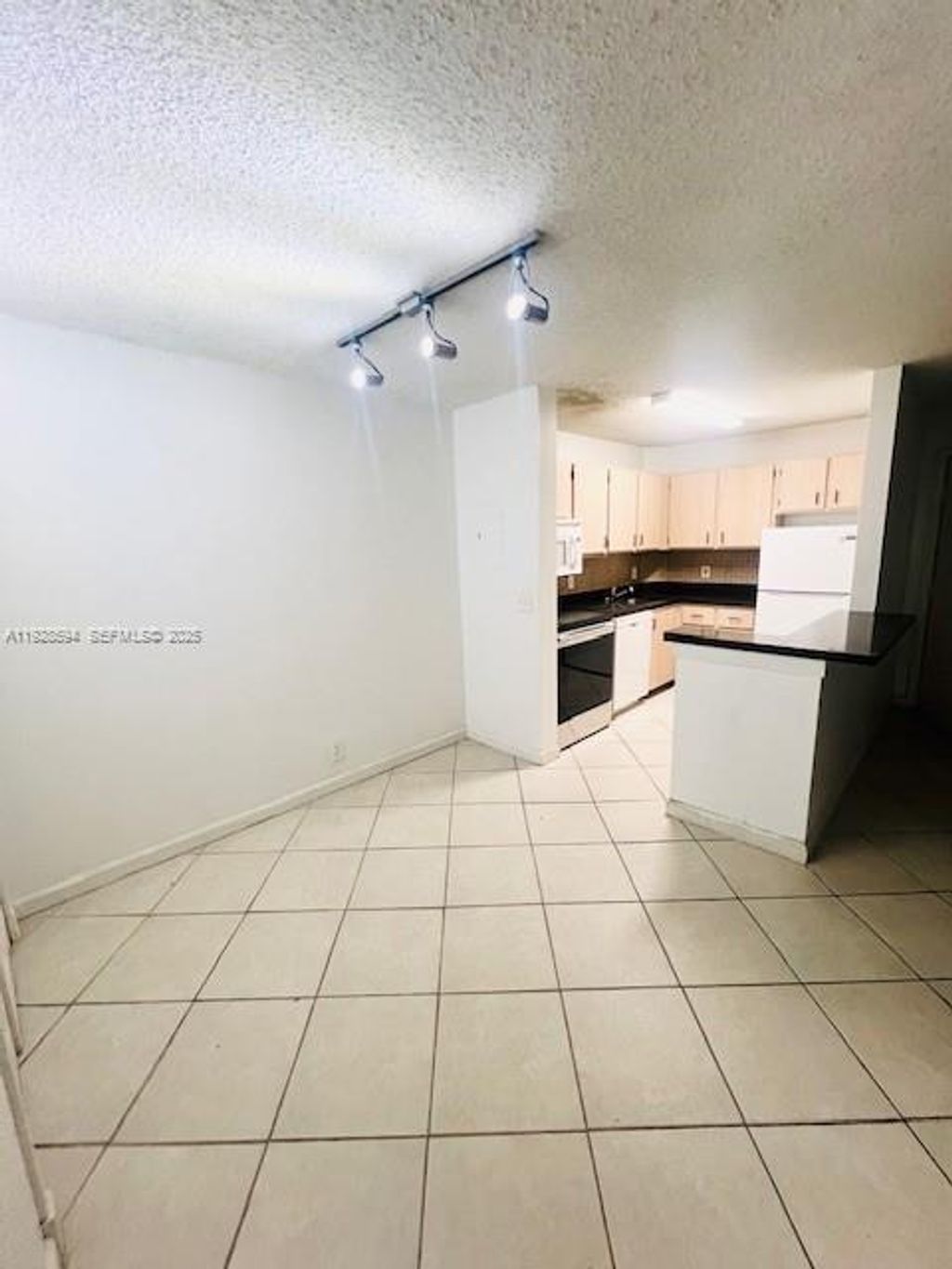 Photo of 10717 Cleary Blvd #206, Plantation, FL 33324 (MLS # A11928594)