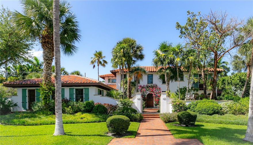 This two-story Mediterranean revival home, originally built in 1924 by Millard Lightbrown and registered as a historic property, underwent a complete rebuild in 2006. Situated less than one block from the Intracoastal, this 4-bedroom, 4.5-bathroom estate occupies a 1/2-acre corner lot.The property boasts various entertaining spaces, including covered patios, an exterior Florida room with a fireplace, a BBQ area, a lap pool, gym, and beautifully landscaped surroundings. With custom millwork, impact windows and French doors, and a chef’s kitchen, this luxurious residence offers an exquisite living experience. Additionally, there is a 2-story guest house featuring a 1-bedroom with a full bathroom and kitchenette. The second floor includes another bedroom with a balcony overlooking the pool.