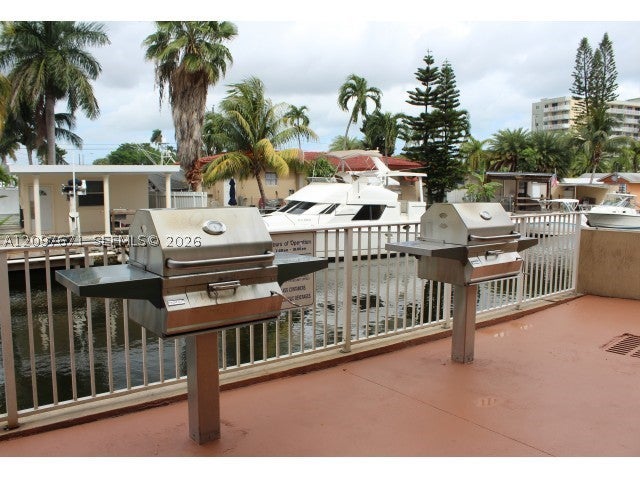 Photo of 4031 N Pine Island Rd #405, Sunrise, FL 33351 (MLS # A12097671)