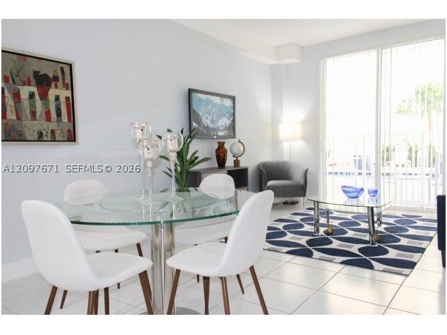 Photo of 4031 N Pine Island Rd #405, Sunrise, FL 33351 (MLS # A12097671)