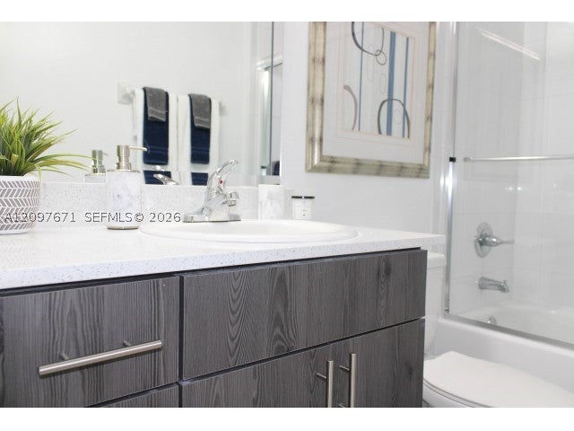 Photo of 4031 N Pine Island Rd #405, Sunrise, FL 33351 (MLS # A12097671)
