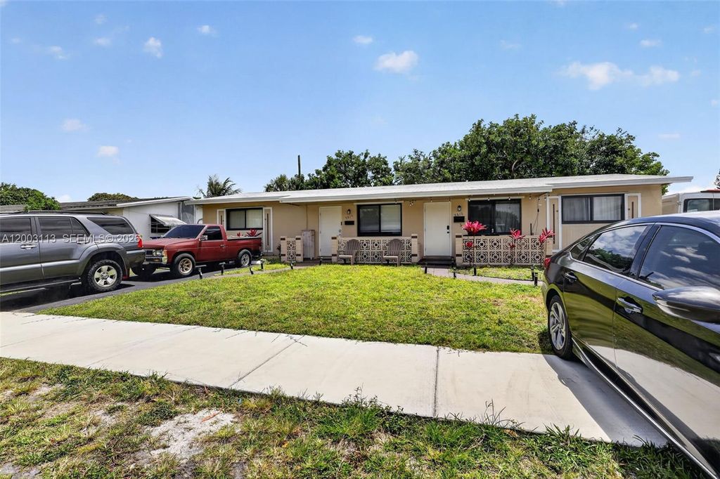 Photo of 5814 Cleveland St, Hollywood, FL 33021 (MLS # A12003113)