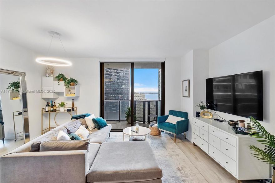 Welcome to this modern urban living at Brickell Heights. This beautiful 1 bed plus den unit offers a perfect blend of luxury, comfort, and convenience in the heart of Miami's vibrant Brickell neighborhood. The chic and contemporary design features high-end finishes, sleek flooring, and floor-to-ceiling windows that showcase breathtaking water and city views.