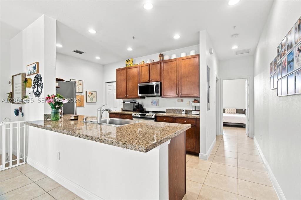 Photo of 1075 SW 147 Ave #5601, Pembroke Pines, FL 33027 (MLS # A12064965)
