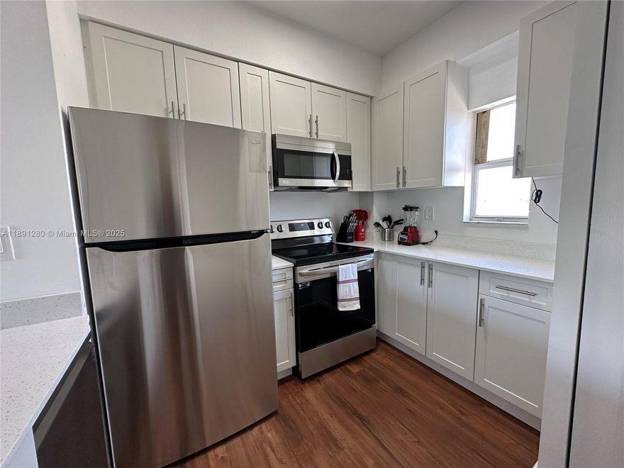 Newly remodeled 2 bed 1.5 ba condo in small, three story 2007 construction building. Upgrades include: New flooring, new kitchen, new bathroom, new washer/ dryer, new stainless steel appliances throughout, new A/C unit, new furniture. Unit is fully furnished and fully equipped. Unit rents furnished for $2,600 a month. Very Private gated building in City of miami . Only ten units. Unit has a covered parking space. Close to the hospitals.  Wall mounted smart Tv's in living room and both bedrooms. One room has a half bath. Walking distance to calle ocho. Quick association approval. Water included in the low maintenance fee. Building has no elevator