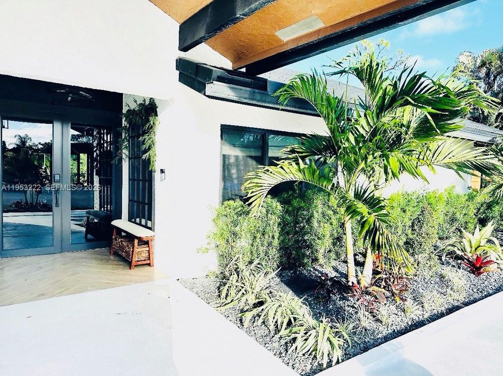 Photo of 2475 NW 25th St, Boca Raton, FL 33431 (MLS # A11953222)