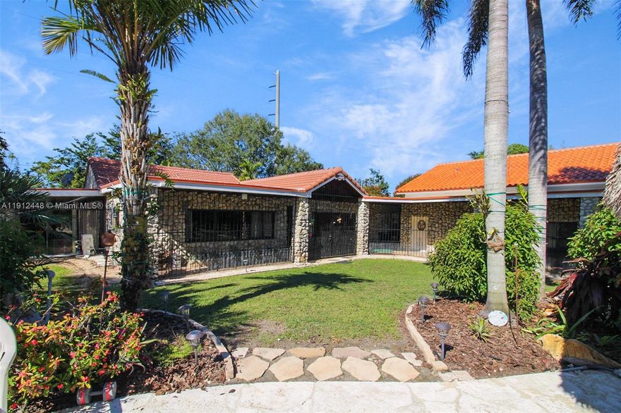 Great Redlands Investment Opportunity-16.07 Acre Improved Agricultural Property directly on 147 Avenue. Has complete thick Privacy Coral Stone Wall on the west side of the property. The remaining three sides are fenced. The property includes a 5000 square foot air conditioned warehouse with walk in cooler, Air-conditioned executive office, bathroom with shower. The property is currently a farm with tree groves, Limestone pit pond, and fruit trees. Property has two containers for tools and storage. Property has water well pump house for irrigation, and septic tank. This sale price includes the 5000 square foot residential building, Limestone Salt water pool, carport, and 3 car garage, Showings by appointment only. please see Business/Land MLS #A11912419