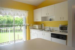 IMAGES OF KENDALL CONDO - Residential Lease