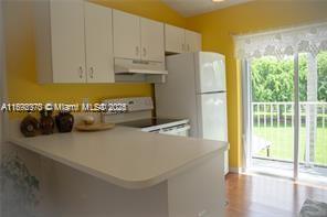 IMAGES OF KENDALL CONDO - Residential Lease