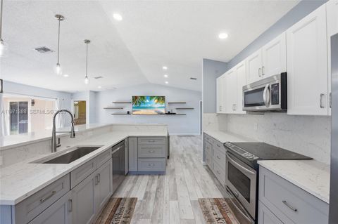 Tiny photo for 3810 NW 58th St, Coconut Creek, FL 33073 (MLS # A11971388)