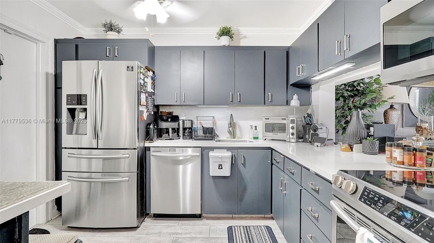 This spacious Upgraded 2BR, 2BA condo in a sought-after 55+ community features a bright, open living area with double ceiling sliders leading to a large screened-in patio. The upgraded kitchen boasts stainless steel appliances, an extra-large double fridge, plenty of cabinet space, Quartz countertops, & eating space. Both bathrooms have been remodeled—one with a tub and the other with a shower & dual sinks. Laminate tile floors & crown molding add to the appeal. Tons of closet space throughout & additional storage available. Enjoy amenities like a fitness center, clubhouse, pool, & common laundry. Ideally located just 10 minutes from the beach & close to Gulfstream racetrack & casino, Aventura Mall, restaurants, supermarkets, and hospitals.