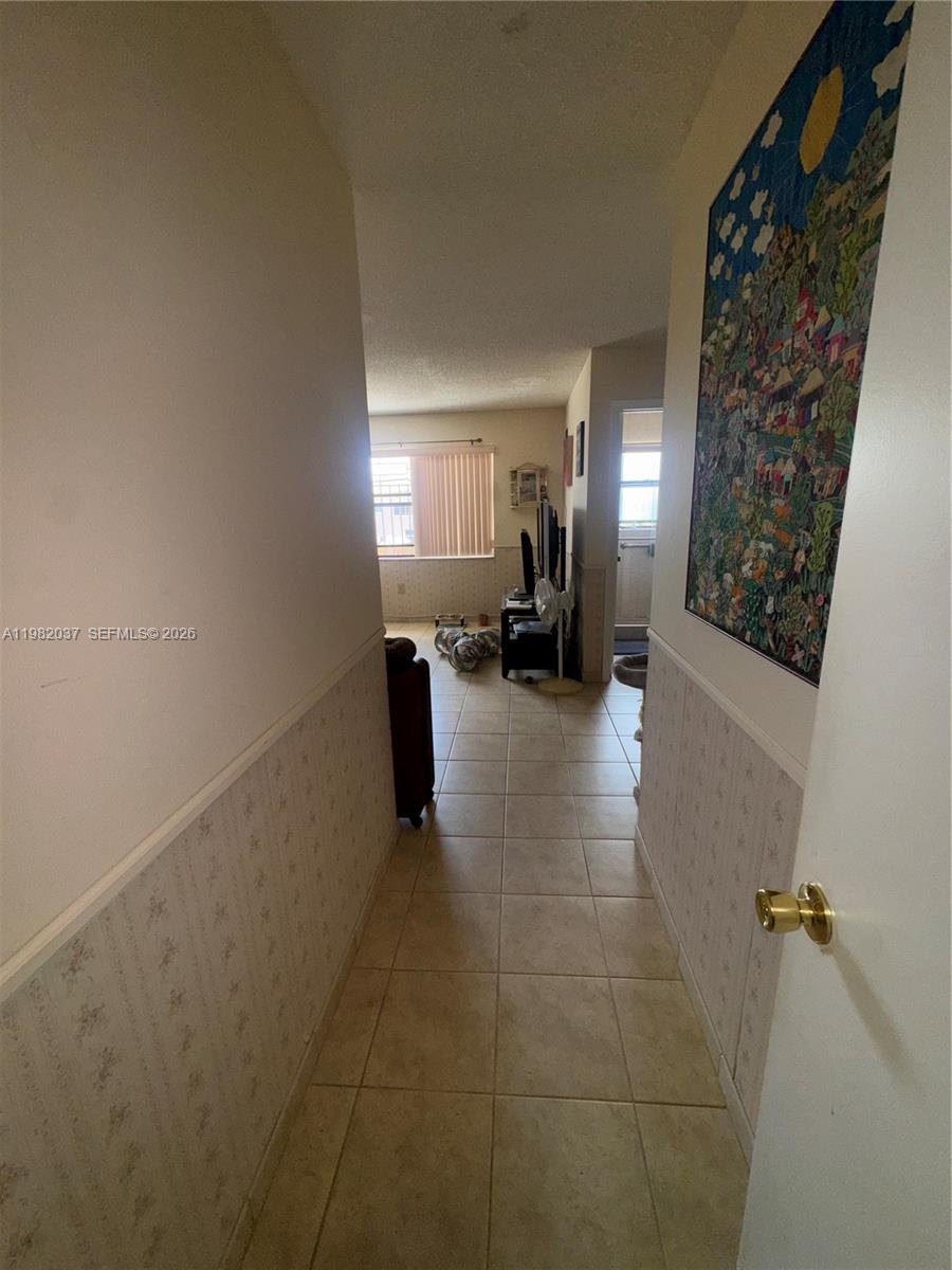 TAMIAMI LAKES TOWNHOUSES - Residential