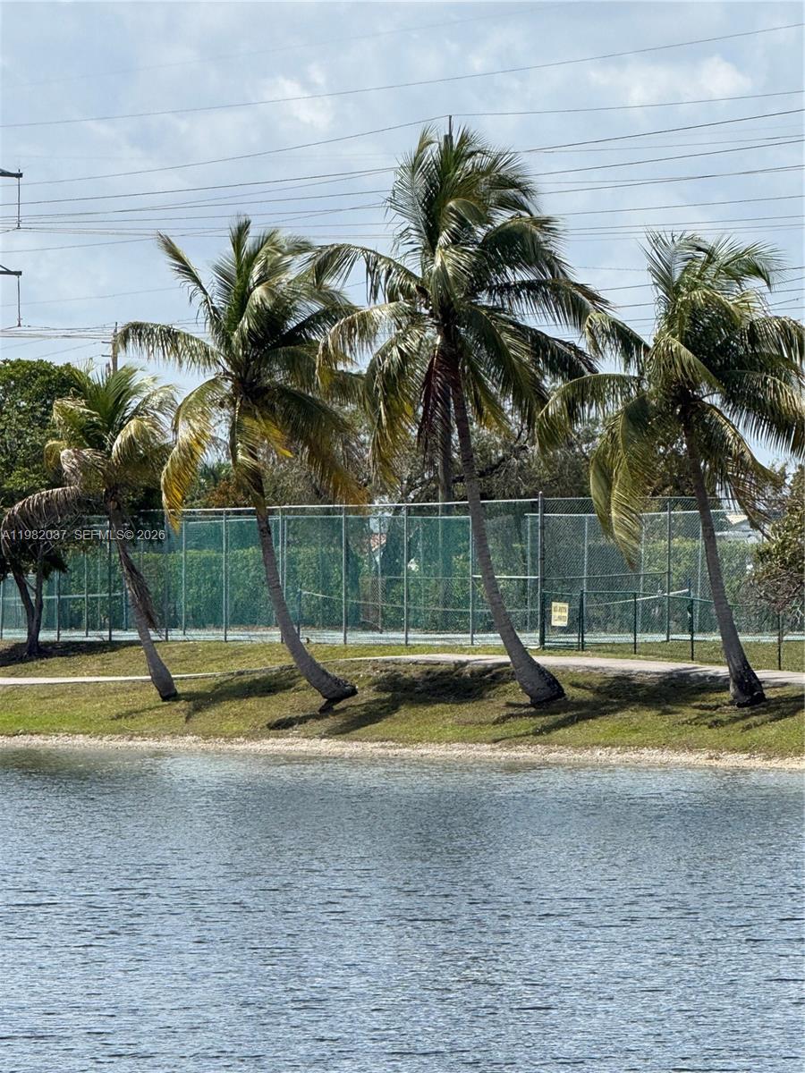 TAMIAMI LAKES TOWNHOUSES - Residential