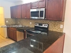 Photo of 6979 SW 40th St #6-O, Miramar, FL 33023 (MLS # A12076332)