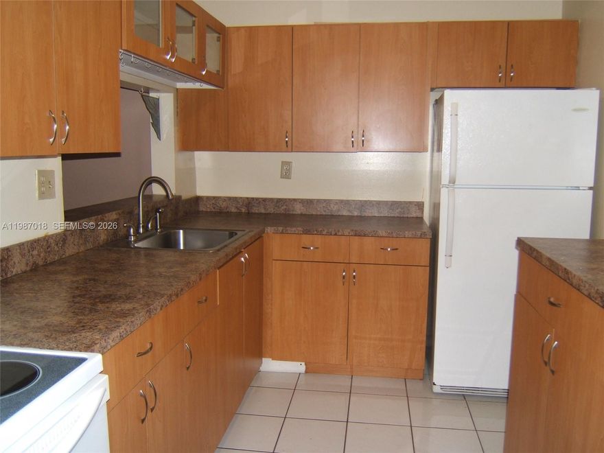 Priced for quick sale.  first floor unit with screened patio overlooking green area. Seller may consider contribution to Buyers closing costs, yes , contribution to buyers closing costs or help to cover special assessment payoff. show anytime. Has its own washer, dryer. (Not community laundry.) Its cozy ,convenient Kendall area, and so affordable. Live in condition.

Please see mls attachment for condo docs including budget and insurance