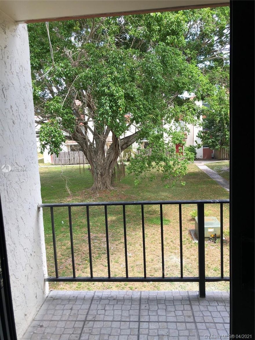 Rarely available large 3 bedrooms / 2.5 bathrooms TOWNHOUSE in Tree Garden located on the second floor of a 3 story building in an all age gated community. Private entrance! Unit can be rented. Nice and bright unit with updated kitchen and bathrooms, large living room area, tile flooring throughout first floor, and a laundry/utility room with full size washer/dryer. Hurricane Windows. Water and trash collection is included on the HOA maintenance fee!! Community Pool & Clubhouse. Also Great Investment Property. CASH, CONV and VA.