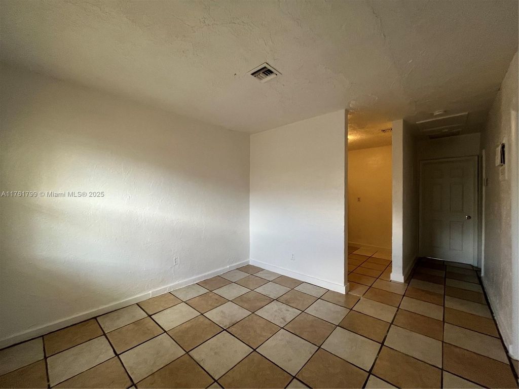 Photo of 3024 NW 2nd St #1-3, Pompano Beach, FL 33069 (MLS # A11761799)