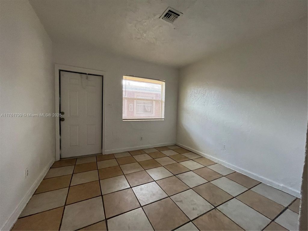 Photo of 3024 NW 2nd St #1-3, Pompano Beach, FL 33069 (MLS # A11761799)
