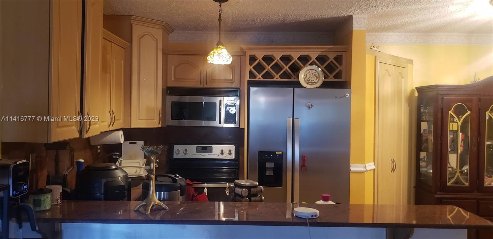 The only currently available unit in the desired gated community, Lago Grande. This 3 bedroom, 2 bath has a screened in porch and is ready for you to make it your own. Also great for investment property as you can rent right away. Priced to sell quickly, motivated Seller. Community features swimming pools, basketball court, and playground area. Assigned parking space + guest parking available.