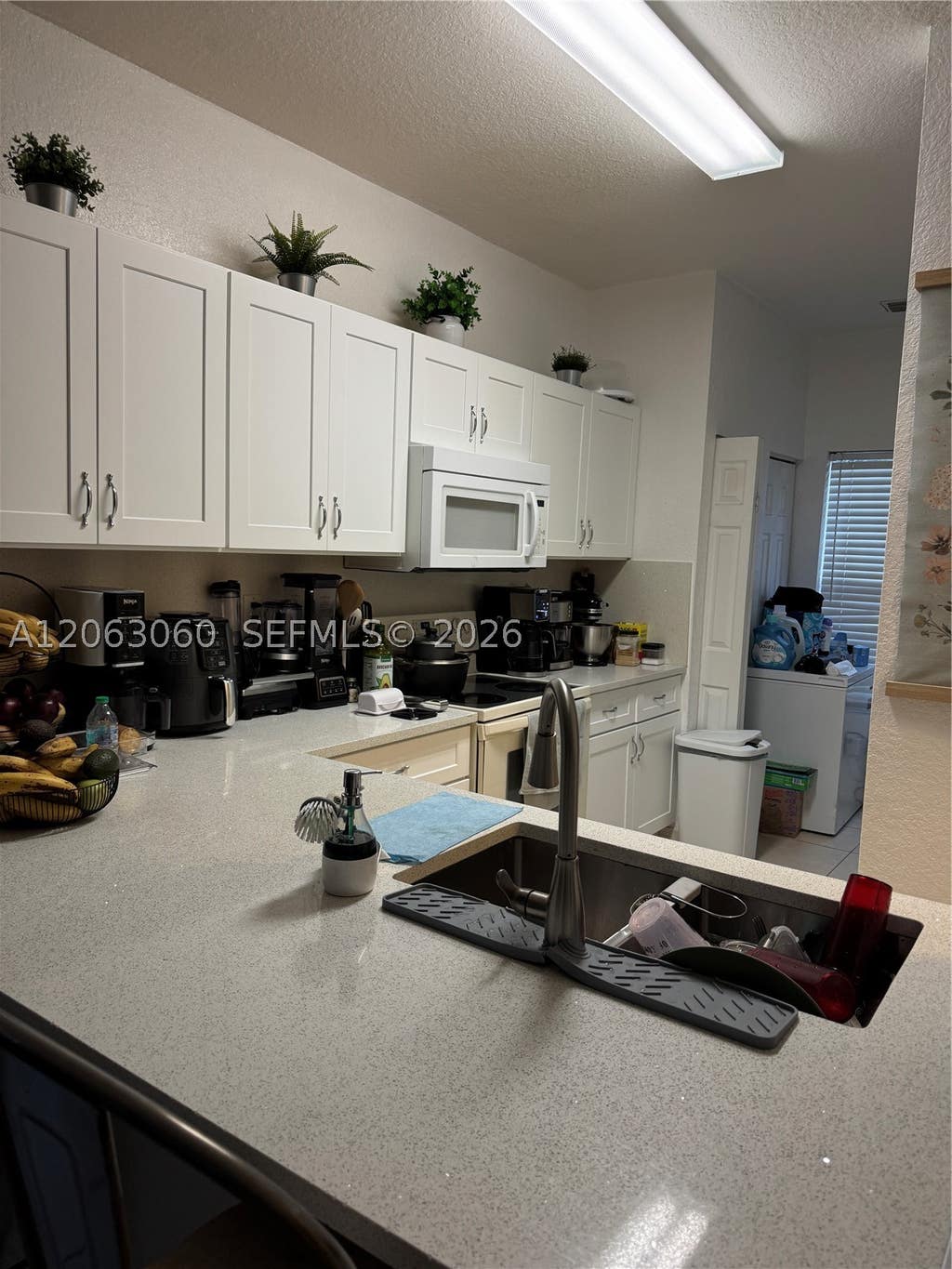 Photo of 4917 SW 140th Ter #9, Miramar, FL 33027 (MLS # A12063060)