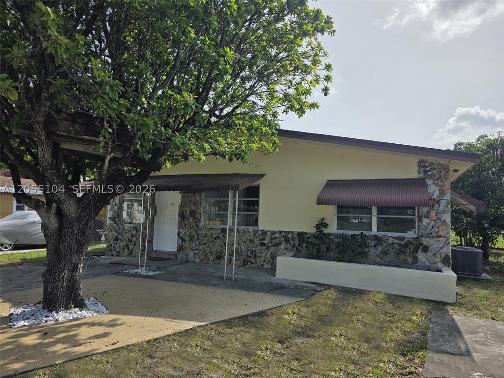 Photo of 46 NW 14th Ct, Dania Beach, FL 33004 (MLS # A12055104)
