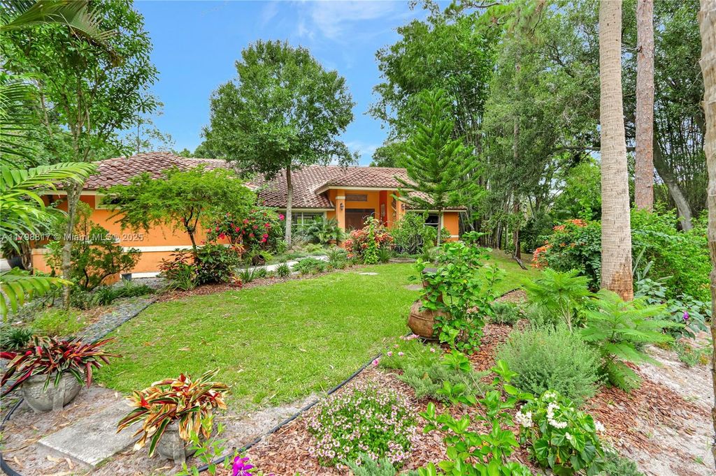 Photo of 95 E Westwood Cir E, West Palm Beach, FL 33411 (MLS # A11798817)