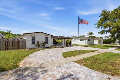 Photo of 9120 SW 55th St, Cooper City, FL 33328 (MLS # A12056539)