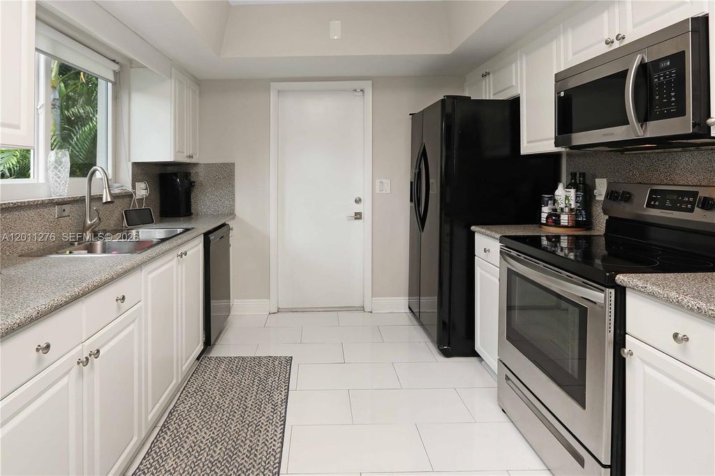 Photo of 1333 Tyler St, Hollywood, FL 33019 (MLS # A12011276)