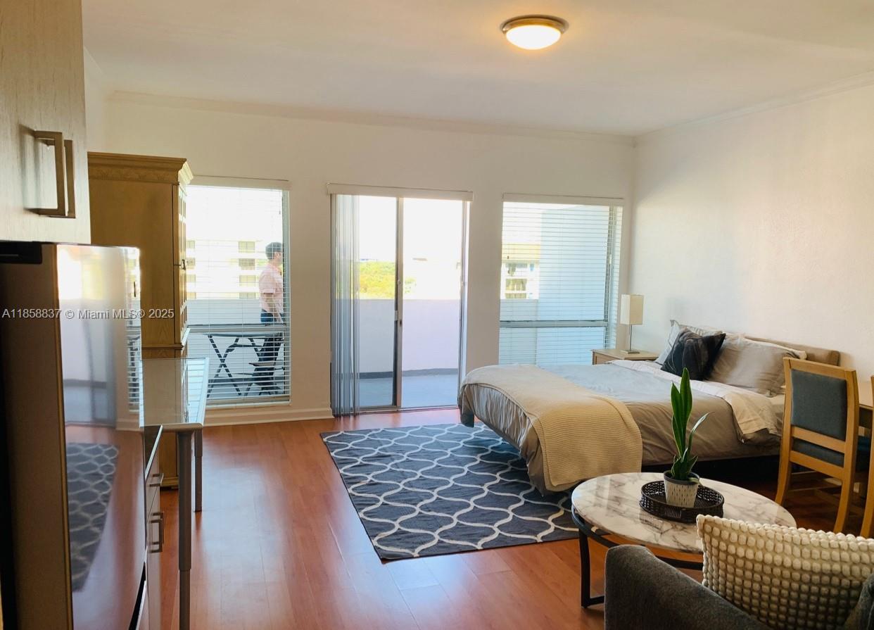 Beautiful fully furnished PH studio with balcony and spectacular view of Gables skyline, Granada Golf course. 1 assigned parking space. Electricity, water/sewer, basic cable, hot water, A/C are all included. The David William Condo has a great location, close to Downtown Coral Gables' shops, restaurants & University of Miami. For showings see broker remarks. 24-hour notice to show via text. Yearly rental! No range, two burner and portable oven available.