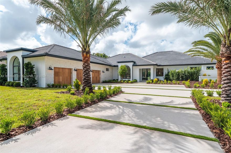 Step into this newly renovated single-level, soft contemporary masterpiece. Nestled in the exclusive Breakers West Country Club Gated Community, this custom residence epitomizes luxurious living with fine finishes and a stunning open-concept design. 
The open floor plan brims with natural light and seamlessly connects with the outdoor living spaces, which feature a resort-style rear yard complete with covered patio, a pool, built-in BBQ, and an outdoor shower. Culinary enthusiasts will appreciate the state-of-the-art kitchen equipped with marble countertops and Thermador appliances. New 2024 Roof, White oaks Hardwood floors throughout, the primary suite offers a walk-in closet and a pool view overlooking the lake and Mayacoo Golf Course. Don’t miss the opportunity to call this place home!