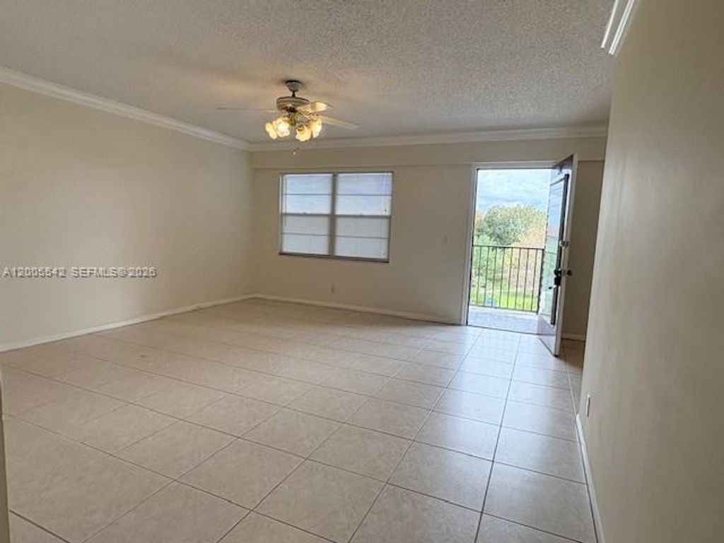 Photo of 13155 SW 7th Ct #402E, Pembroke Pines, FL 33027 (MLS # A12005542)