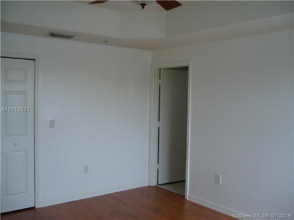 THE COURTS AT DORAL ISLES - Residential Lease