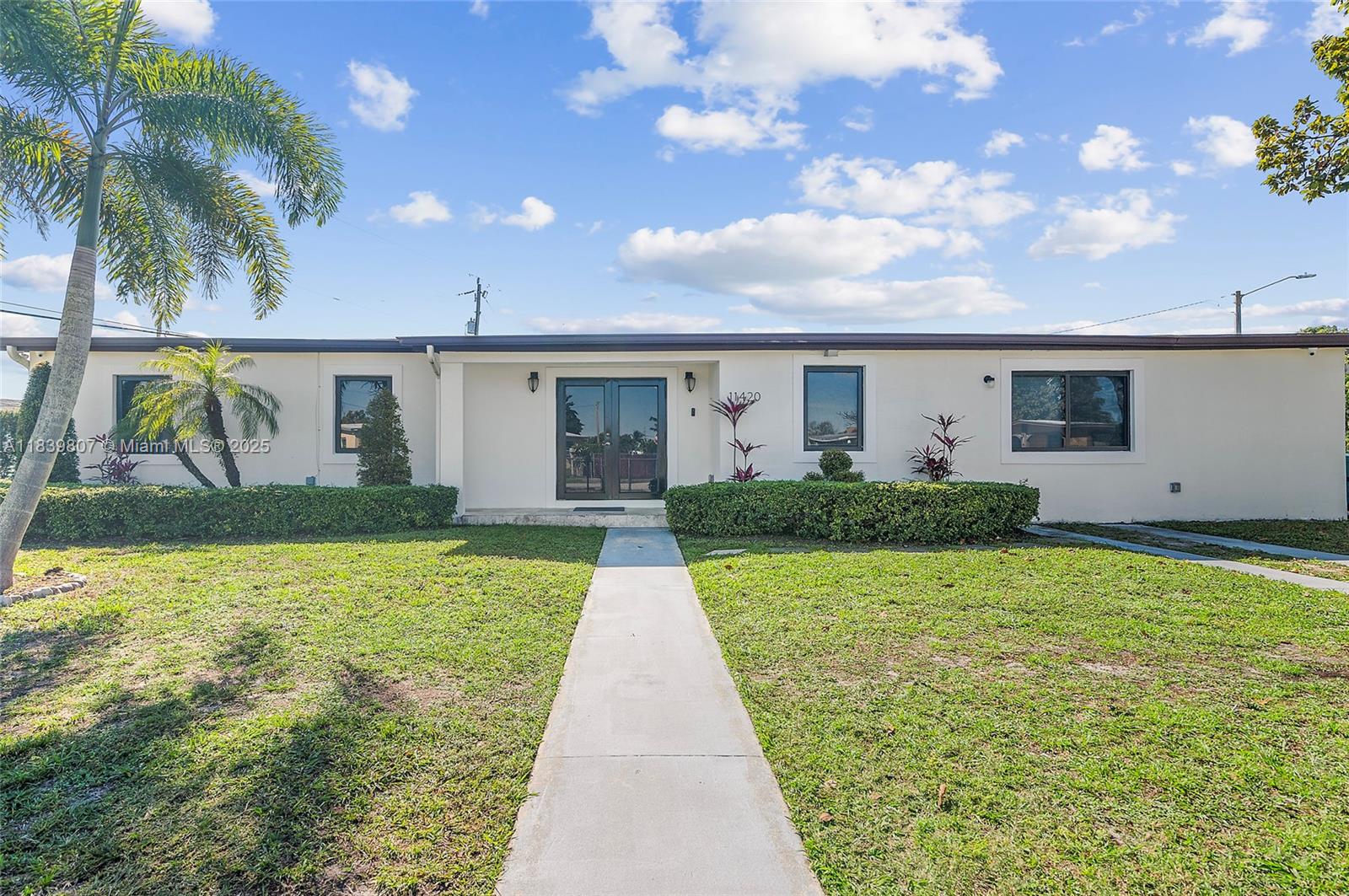 Move-in ready, bright & airy & beautifully updated, this single-family home sits on a desirable corner oversized lot with plenty of space for a pool,RV,boat. Featuring 3 bedrooms,3 full bathrooms, & spacious master suite with dual vanity and walk-in closets, this home offers comfort and style. Enjoy peace of mind w/ all impact windows & doors, 2 A/C units, 2 tankless water heaters, & LED recessed lighting throughout. Additional highlights include :laundry room,screened patio, stainless steel appliances, & municipal sewer. A perfect blend of space, convenience, & modern upgrades! Centrally located near FIU, Turnpike, shopping,hospital, parks, restaurants & more. 2016,2018 Roof,A/C & water heaters. NO ASSOCIATION !! Total living area is 1432 SF per seller.