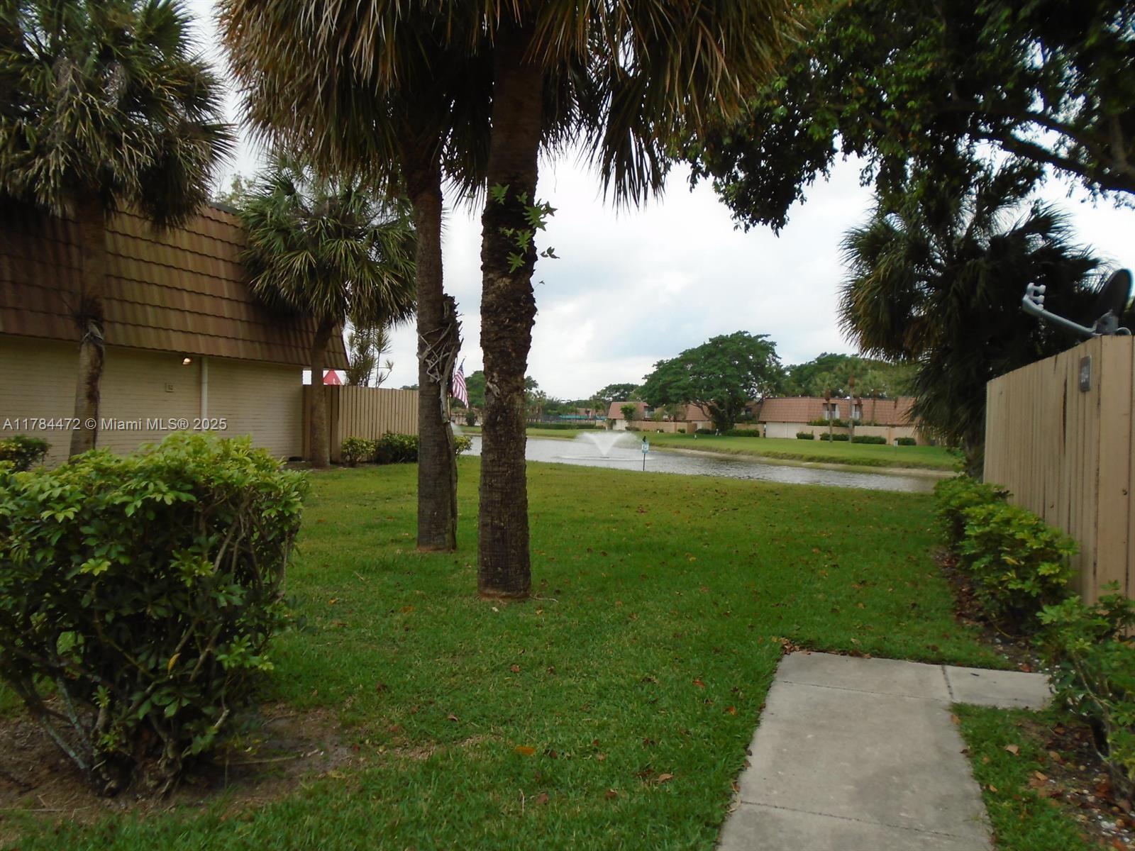 Waterside Luxury Townhomes is a non-gated community located in West Palm Beach. This townhouse with fenced patio has two master bedrooms and each has their own bathroom. Newer stainless steel appliances in kitchen with granite countertops. Tile on first floor and carpet on second floor in bedrooms. Full size newer washer and dryer. Open balcony with sliding doors from both bedrooms overlooks garden view. Community includes fitness center, pool and tennis courts. Near major roads, shopping, highways, restaurants, beaches, parks and more. TENANT OCCUPIED UNTIL OCTOBER 31ST, 2025 and paying $2300 per month. SERIOUS BUYERS ONLY