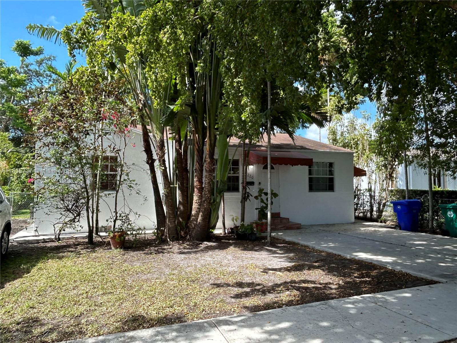 Beautiful Gem in Little Gables 3 Bed 1 bath amazing backyard full of trees.