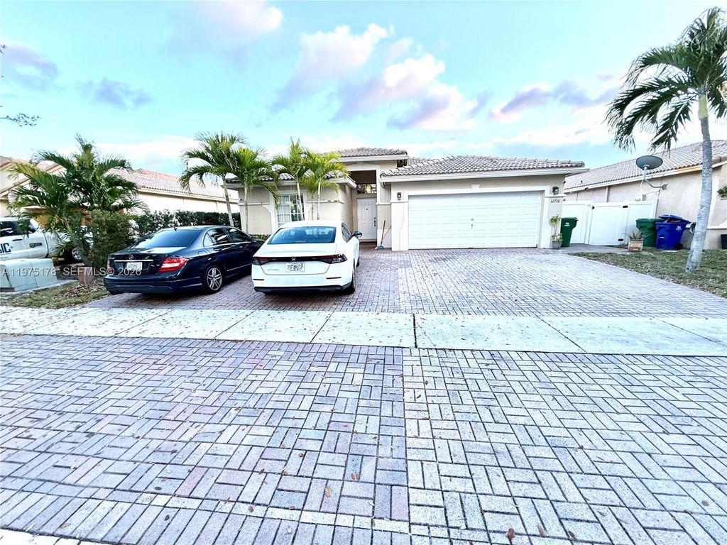 Photo of 12718 SW 47th St, Miramar, FL 33027 (MLS # A11975178)