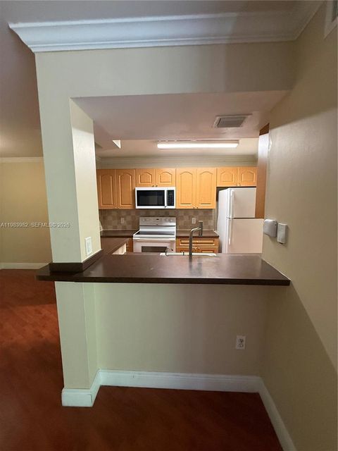 Photo of 7165 NW 186th St #A204, Hialeah, FL 33015 (MLS # A11983982)