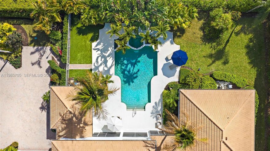 Located on a large lot on the east side of Admirals Cove, this home offers a rare combination of space, privacy, and a full golf membership. Tasteful updates have been made throughout, and the first-floor primary suite provides comfort and convenience with easy access to the main living areas. The oversized lot provides generous outdoor space with a large pool and expansive backyard ideal for relaxing or entertaining. A detached guest house offers private accommodations for visitors, making this property particularly unique. The spacious outdoor areas provide plenty of room to enjoy the Florida sunshine, host gatherings by the pool, or unwind in a private backyard setting.

Admirals Cove is one of Jupiter's most sought-after private communities, offering 45 holes of championship golf, two clubhouses, two driving ranges, a world-class marina with direct ocean access, a state-of-the-art fitness center, tennis and pickleball courts, multiple dining venues, and a full calendar of social and recreational activities.