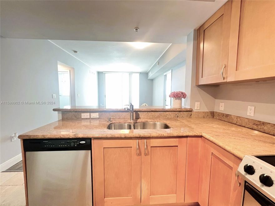 Bright & spacious 2Bed/2Bath in the heart of Hallandale Beach Blvd, a few blocks from the Ocean and steps from Golf course; shopping strip with supermarket and restaurants right downstairs. Brand new floors, granite counter tops & Stainless-steel appliances, Washer/Dryer in unit. Amazing Resort style amenities include movie theater, gym, sauna, pool, jacuzzi, tennis courts, bike storage, 24-hour security and billiard room among others. Party room and valet parking. HOA fee includes water, cable TV, internet, and Total Appliance service contract. Easy access to beaches, Aventura Mall, I95 & FTL Airport. Make this your home or investment.