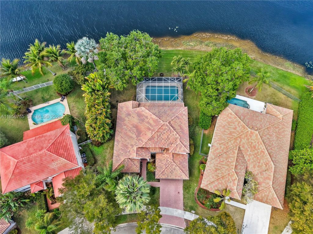 Photo of 637 Lake Blvd, Weston, FL 33326 (MLS # A11956755)