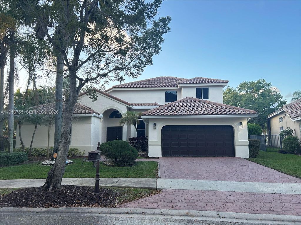 Photo of 637 Lake Blvd, Weston, FL 33326 (MLS # A11956755)