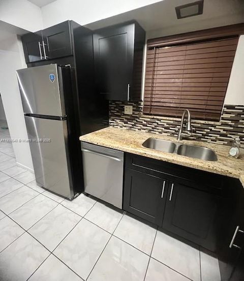 Photo of 3621 NW 95th Ter #523, Sunrise, FL 33351 (MLS # A11908040)