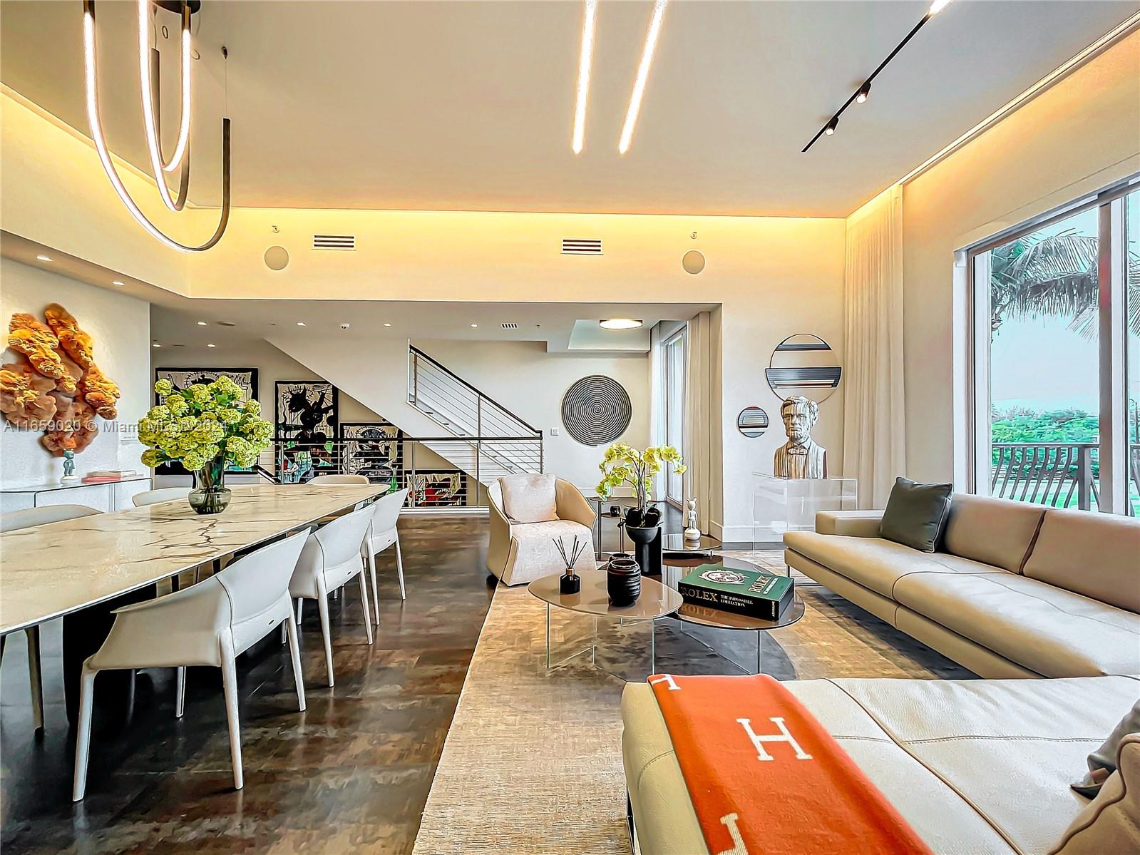 Welcome to beachfront luxury at the beautifully designed Villa V by Estudio Jorge Fuentes. This 3-level Villa has been completely remodeled with the finest finishes and offers 2 bedrooms, 2,5 baths, entertainment room, private elevator & a deeded 2-car garage. All millwork and closets are by Armazen Design. Living room includes desirable paneling design and a custom kitchen with Thermador appliances. Bathrooms include Madeli mirrors with LED/sensors, Smart Toilets and steam shower. Third level offers a large master suite with custom-made dry sauna. Additional features: alarm system, Crestron Home System, security cameras throughout, motorized window treatments and much more. Building includes gym, marina, 2 pools, valet, beach service. Art and furniture not included