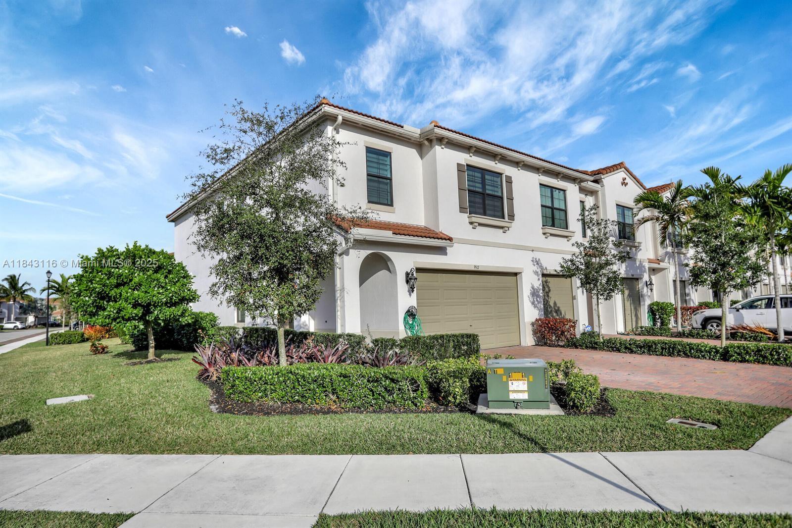 Discover modern townhouse in the prestigious gated community of Enclave at Boca Dunes. This 3-bedroom, 2.5-
bathroom and 2-car garage END unit showcases an expansive layout with an additional loft! Kitchen equipped with
a quartz center island, double WIFI ovens, and built-in wine racks. Enjoy the custom electric window treatments
and plank tile flooring throughout. The generous bedrooms offer ample closet space, while the primary suite
features a spa-like bathroom with built-in closets. Hurricane impact windows and alarm system installed for added
security. Experience resort-style amenities including a clubhouse, pool, heated spa, billiards, tot's play area,
walking paths, and a state-of-the-art fitness center. Top-rated schools.
