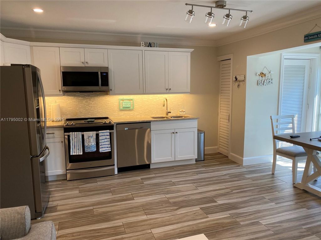 Photo of 11000 S Ocean Dr #211, Jensen Beach, FL 34957 (MLS # A11795002)