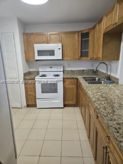 1351 NE 191st St E206
